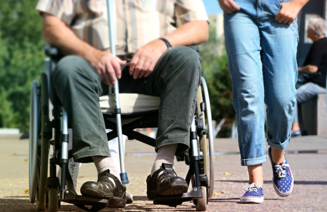 a man on a wheel chair